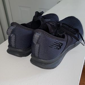 Black New Balance sneakers